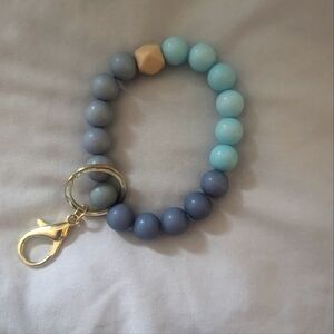 Blue toned bracelet keychain